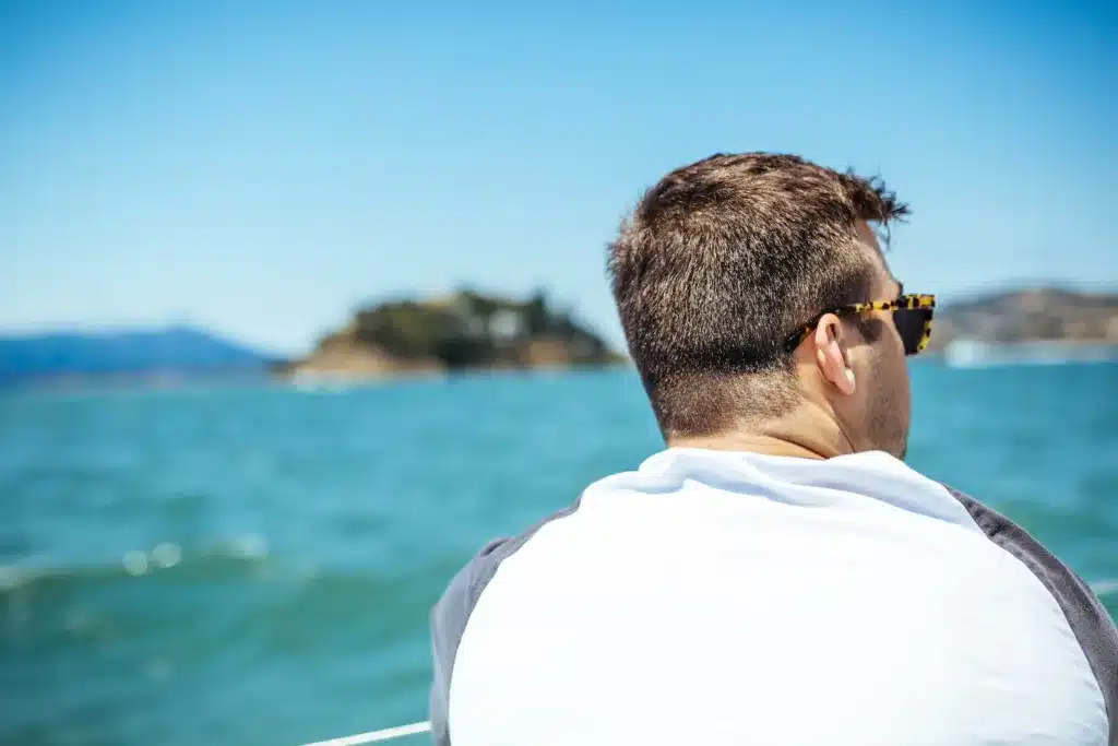 man looking at the sea - awaken your intention, Feeling stuck, Dreams and aspirations