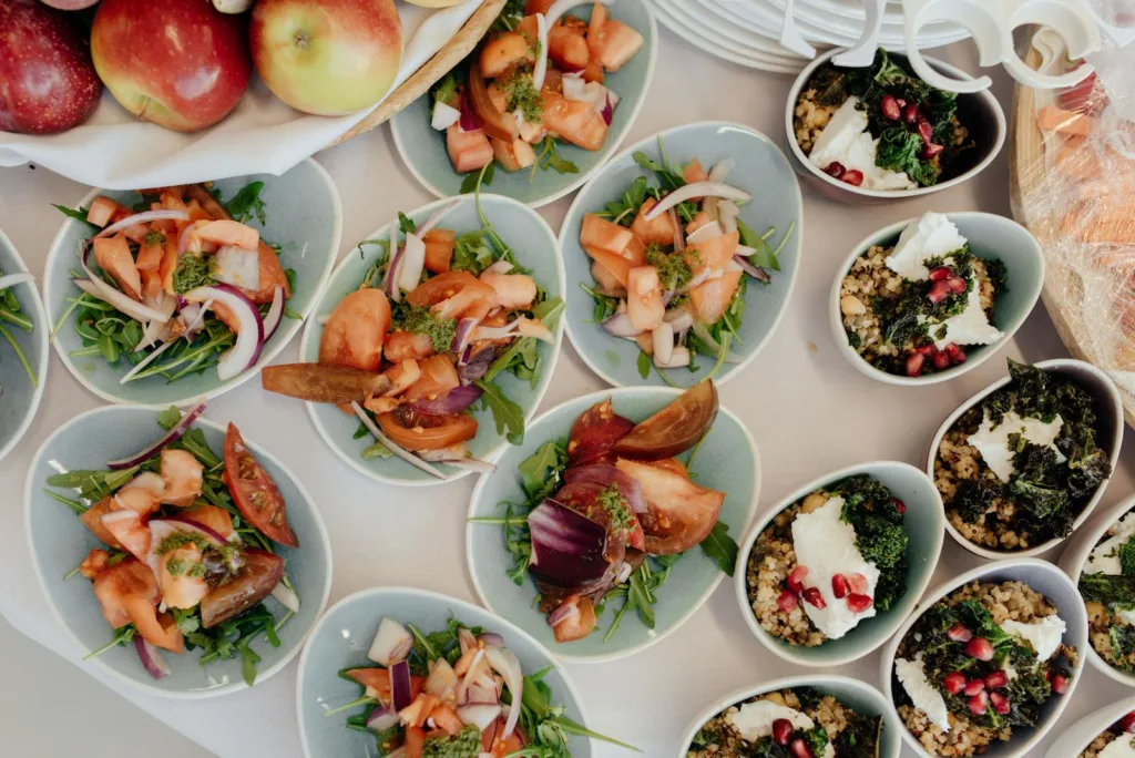 Top view of delicious salads with ripe vegetables prepared for breakfast in daytime. starter's guide, balanced diet, stress relief strategies, busy professional